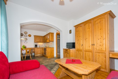 Foto Wohnraum mit Küche in Appartement EG
